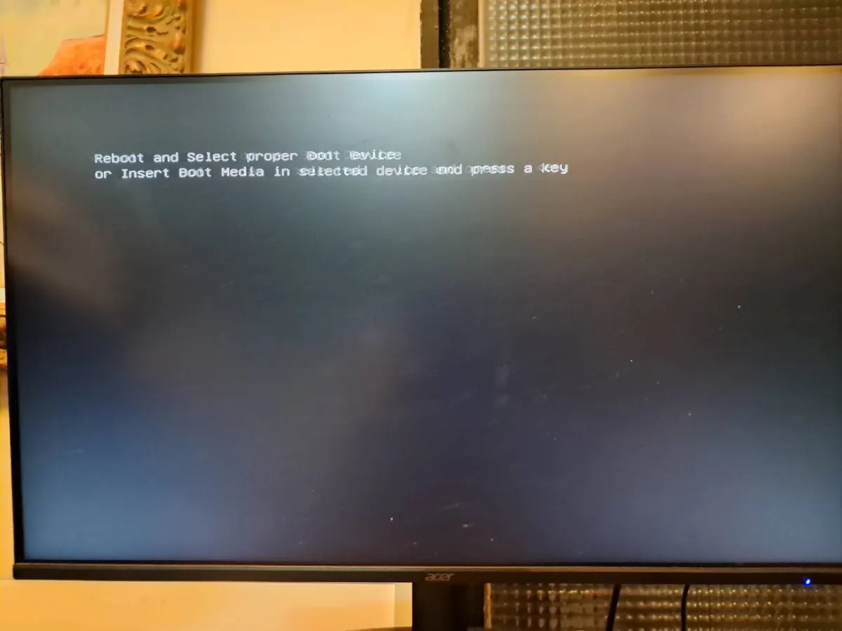 Acer桌上型電腦螢幕顯示reboot and select proper boot device錯誤訊息畫面 維修照片 2
